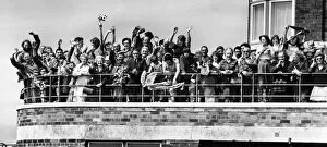 01048 Collection: Liverpool fans gathered on the balcony at Speke Airport as their idols board their plane