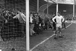 Goalkeeper Prints: Liverpool fans spill on to the field much to the annoyance of the Walsall goalkeeper
