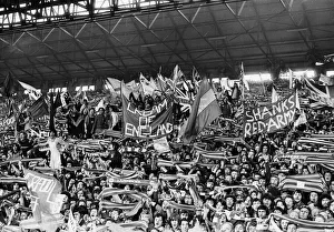 Flags Prints: Liverpool fans syupporters in the Kop during a league match against Leicester City