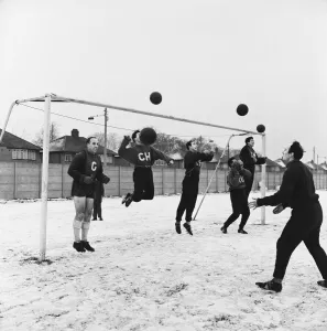 Goalkeeper Prints: Liverpool FC footballers training in the snow ahead of their FA cup match against Wrexham