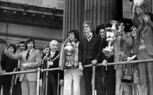 Liverpool FC players including Kevin Keegan and Phil Thompson celebrate after