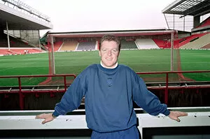Images Dated 7th October 1993: Liverpool football player Steve Nicol poses in the Kop stand at Anfield Stadium