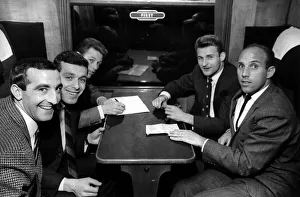 Paper Prints: Liverpool football players sitting in first class as they wait for train to depart