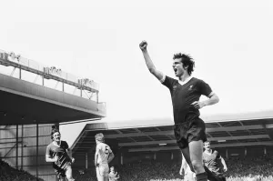 Liverpool Football team celebrate winning the League title after defeating Aston Villa