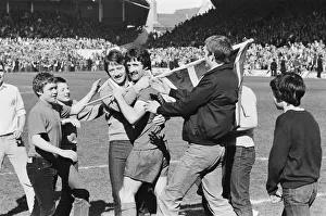 Liverpool Football team celebrate winning the League title after defeating Aston Villa