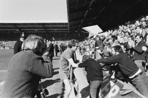 Liverpool Football team celebrate winning the League title after defeating Aston Villa