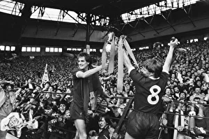 Liverpool Football team celebrate winning the League title after defeating Aston Villa