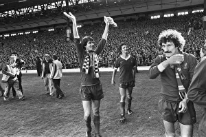 Liverpool Football team celebrate winning the League title after defeating Aston Villa