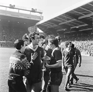 Liverpool Football team celebrate winning the League title after defeating Aston Villa