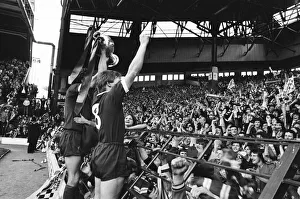Liverpool Football team celebrate winning the League title after defeating Aston Villa