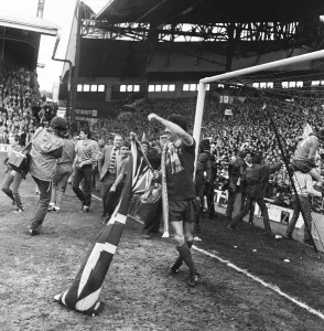 Liverpool Football team celebrate winning the League title after defeating Aston Villa