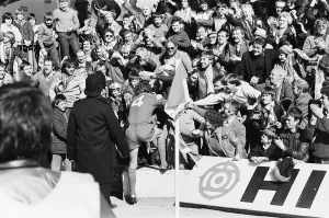 Liverpool Football team celebrate winning the League title after defeating Aston Villa