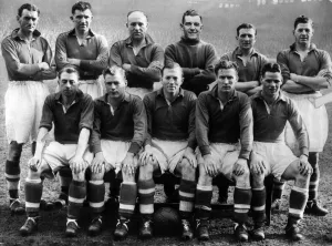 Liverpool football team pose for a group photograph before the League Division metahc