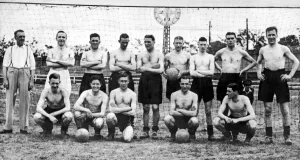 Topless Prints: Liverpool football team pose for a group photograph during their tour of the Balknas