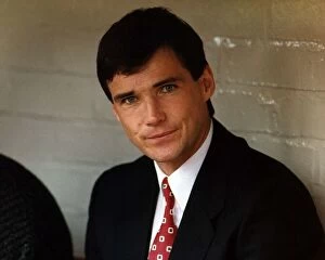 Images Dated 1st December 1988: Liverpool footballer Alan Hansen dressed in suit and tie as he sits on the bench