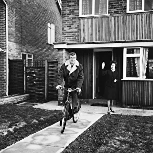 01133 Prints: Liverpool footballer Alf Arrowsmith travels to Anfield on a bicycle bought for him by his
