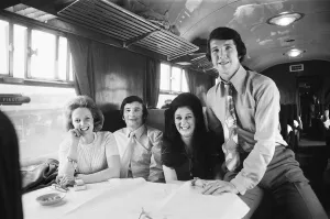 Liverpool footballer Chris Lawler withd his wife Gerladine sits beside teammate Tommy