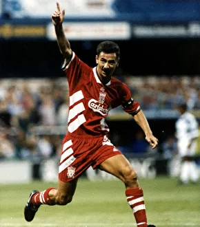 Liverpool footballer Ian Rush celebrates after scoring a goal against QPR during