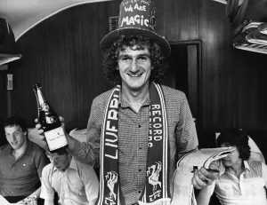 01130 Prints: Liverpool footballer Phil Thomspon wearing top hart and club scarf