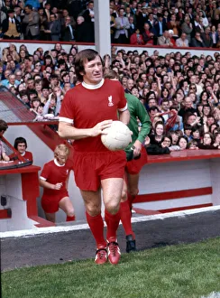 Liverpool footballer Tommy Smith waks on to the pitch before a league division one match