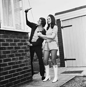 Decorating Prints: Liverpool goalkeeper Ray Clemence decorating his new home at Formby on the Lancashire
