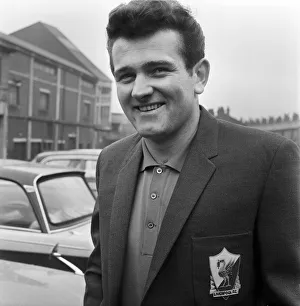 Suits Prints: Liverpool goalkeeper Tommy Lawrence shows off his new suit ahead of the team