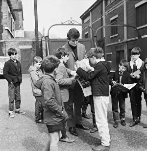 01130 Prints: Liverpool goalkeeper Tommy Lawrence sign autographs for fans outside Anfield football