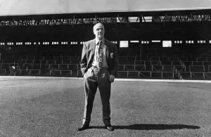 Stand Prints: Liverpool manager Bil Shankly stands in front of an empty stand at Anfield