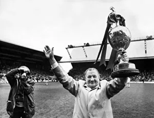 Award Ceremonies Prints: Liverpool manager Bob Paisley celebrates with the League Championship trophy at Anfield