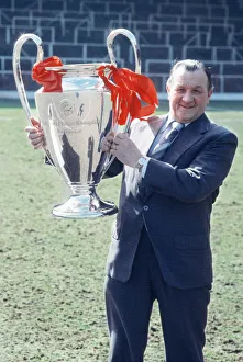 Liverpool manager Bob Paisley poses with the European Cup trophy at Anfield