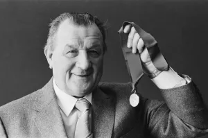 Liverpool manager Bob paisley proudly displays his latest award as
