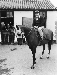Liverpool manager Bob Paisley sitting astride Banner Street