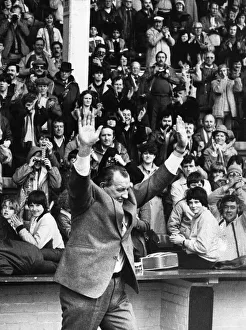Liverpool manager Bob Paisley takes the salute of the crowd the pitch at Anfield as he