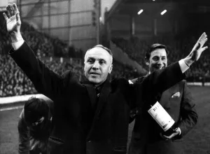 Liverpool manager Bill Shankly acknowledges the applause of the fans cheers as he is