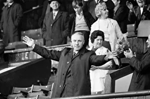 Liverpool manager Bill Shankly acknowledges the cheers of the Kop ahead of his side
