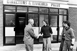 Liverpool manager Bill Shankly greets young fans outside the directors office at Anfield