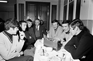 00461 Prints: Liverpool manager Bill Shankly listening to the FA Cup draw with some of his players over