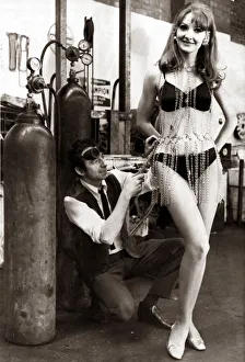 00196 Prints: Liverpool model Terry Duffy of Aintree wearing a chain dress designed by her husband to