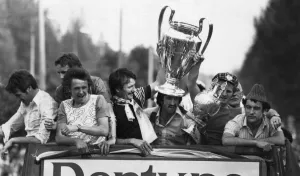 Homecoming Prints: Liverpool show off the League Championship and European Cup trophies to their fans