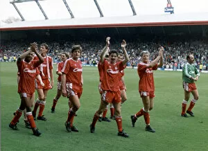 Images Dated 10th April 1990: Liverpool players acknowledge their fans and celebrate winning the League Championship at