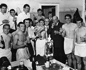 Dressing Room Prints: Liverpool players celebrate winning the league championship following their 2-1 victory