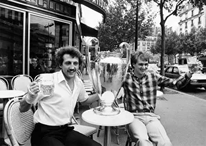 00229 Prints: Liverpool players Phil Thompson and Alan Kennedy celebrate with the European Cup after