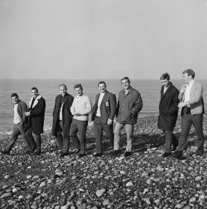 Relaxation Prints: Liverpool players relaxing by spending the day on the beach at Blackpool as they prepare