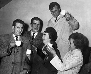 Liverpool players Roger Hunt and Ron Yeats are toasted with champagne after Liverpool won