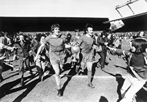 Liverpool players Tommy Smith and Emlyn Hughes parade the league championship trophy