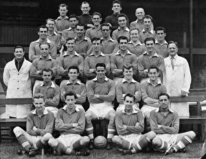 Team Prints: Liverpool squad pose for a pre-season photograph at Anfield