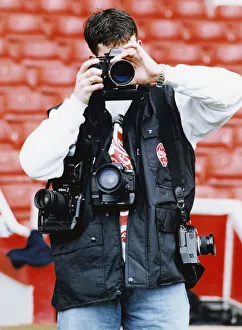Cameras Prints: Liverpool striker Robbie Fowler has Wembley in his sights as he tries his hand behind
