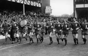 The Liverpool team on a lap pf honour with the Charity Shirld trophy after defeating