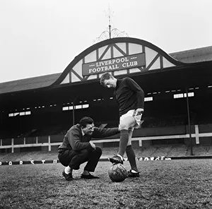 Liverpool team trainer Bob Paisley assesses Skelmersdale United left back Colin Bridge