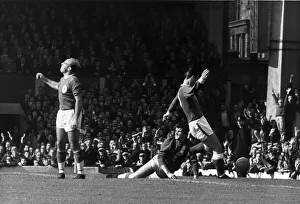 Liverpool v. Everton. Liverpool defender Ronnie Moran is furious as Everton